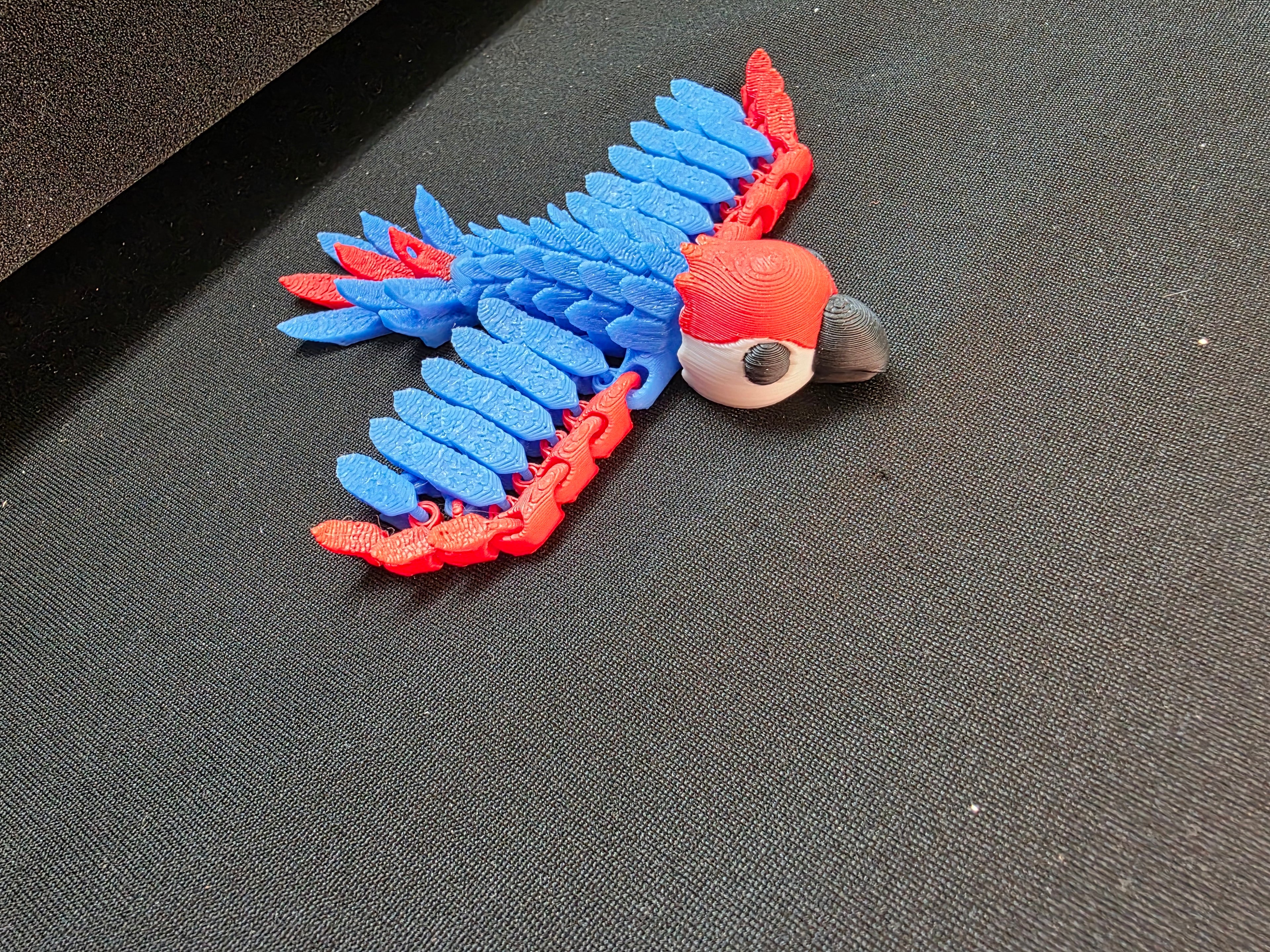 3D Printed Flexible Articulated Parrot Figurine